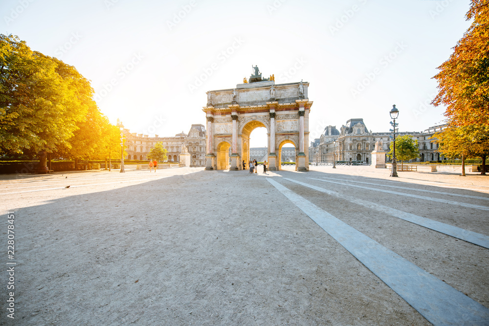 Triumphal arch at Tuileries gardens during the morning light in Paris