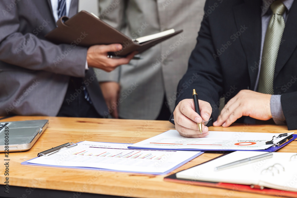 Business and finance concept of office working,Teamwork of Businessmen discussing business investment plan in office Business and finance concept of office working,Teamwork of Businessmen discussing business investment plan in office