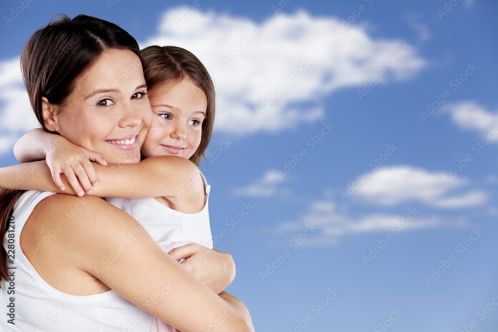 Happy Mother and daughter hugging Happy Mother and daughter hugging