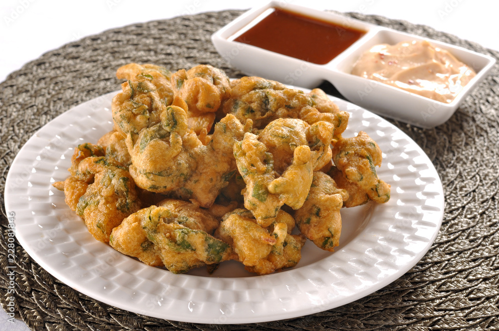 Pakora, a full nutrition spicy food with stuffed onion, chilli & gram flour Pakora, a full nutrition spicy food with stuffed onion, chilli & gram flour