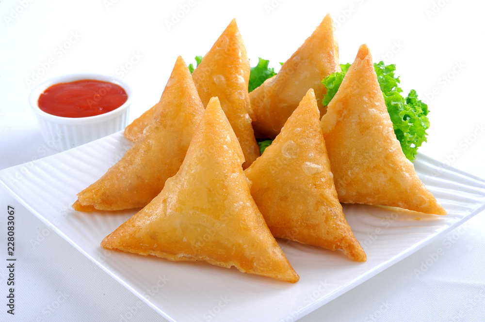 Samosa, Sambusa, Samboksa with a savory filling of chicken, mince, potato & vegetables Samosa, Sambusa, Samboksa with a savory filling of chicken, mince, potato & vegetables