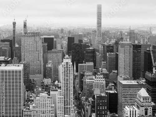 Aerial view of Manhattan skyscraper from Empire state building observation deck. Black and white