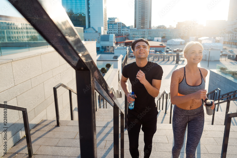 Fototapeta premium Active couple running up