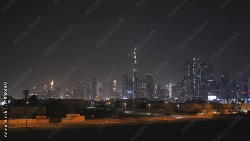 Panorama of skyscrapers of Dubai at night. View of Dubai Greek district.