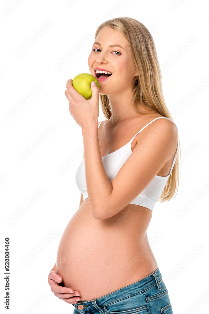 attractive pregnant woman eating green healthy apple isolated on white attractive pregnant woman eating green healthy apple isolated on white