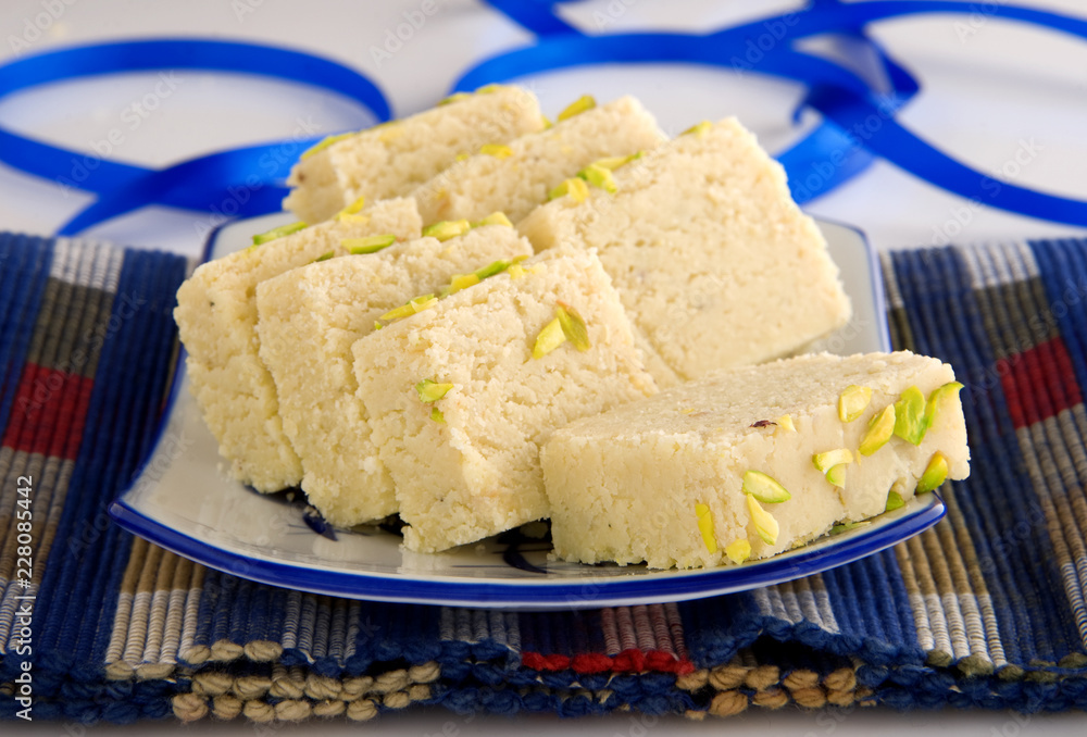 Barfi popular sweet mithai made with condense milk, sugar & cardamom Barfi popular sweet mithai made with condense milk, sugar & cardamom