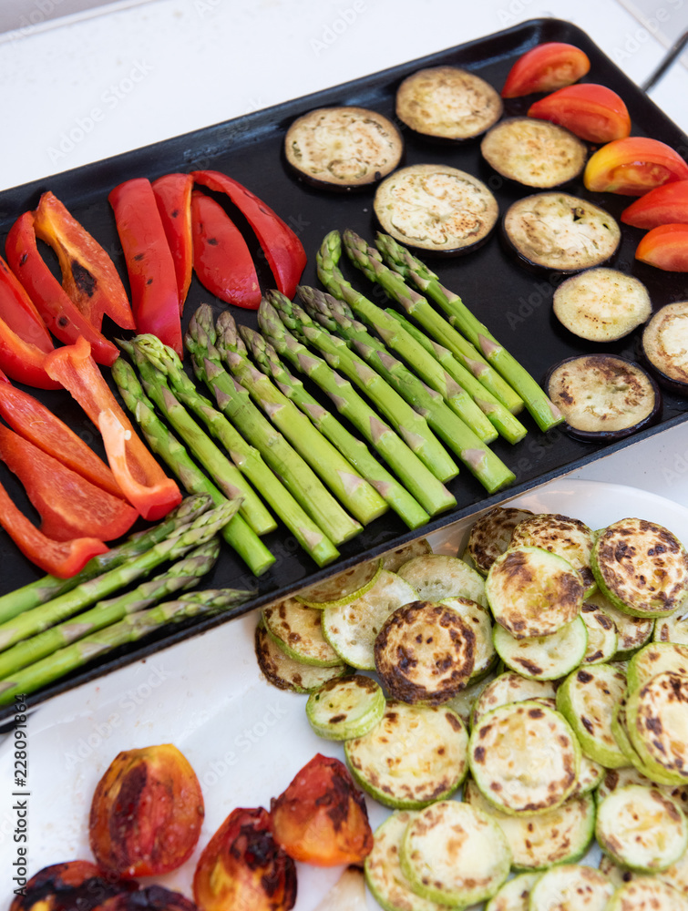 Grilled vegetables, asparagus green tomatoes, zucchini and onions Grilled vegetables, asparagus green tomatoes, zucchini and onions