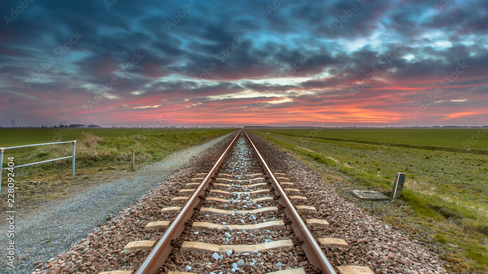 Railroad panorama in open rural countryside