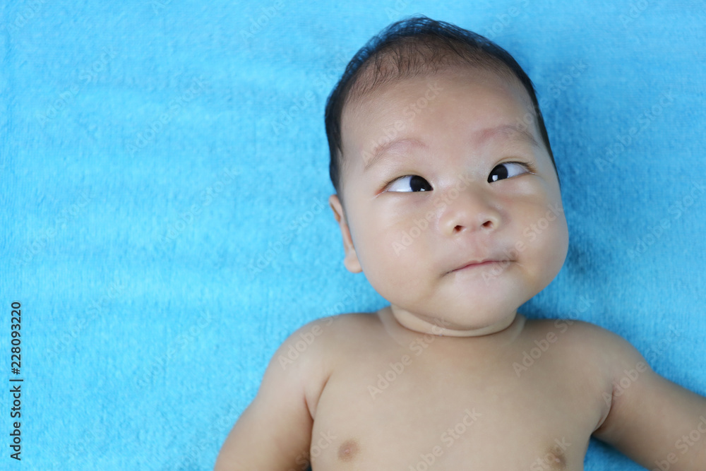 Asian Infant in a surprised on face Feeling. Asian Infant in a surprised on face Feeling.