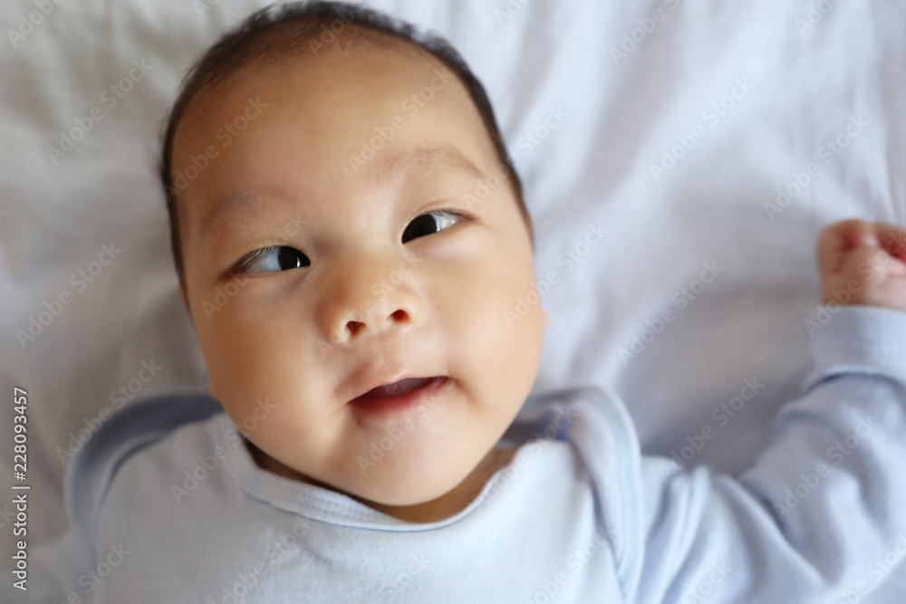 Asian Infant in a surprised on face Feeling. Asian Infant in a surprised on face Feeling.