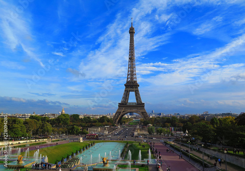 Eiffel Tower in Paris scenic view with the blue sky in summer, Beautiful view of famous Eiffel Tower in Paris, France