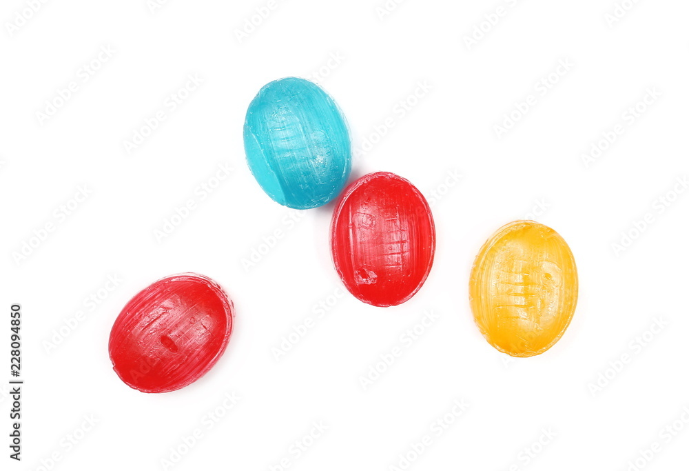 Colorful hard candies with isolated on white background, top view Colorful hard candies with isolated on white background, top view