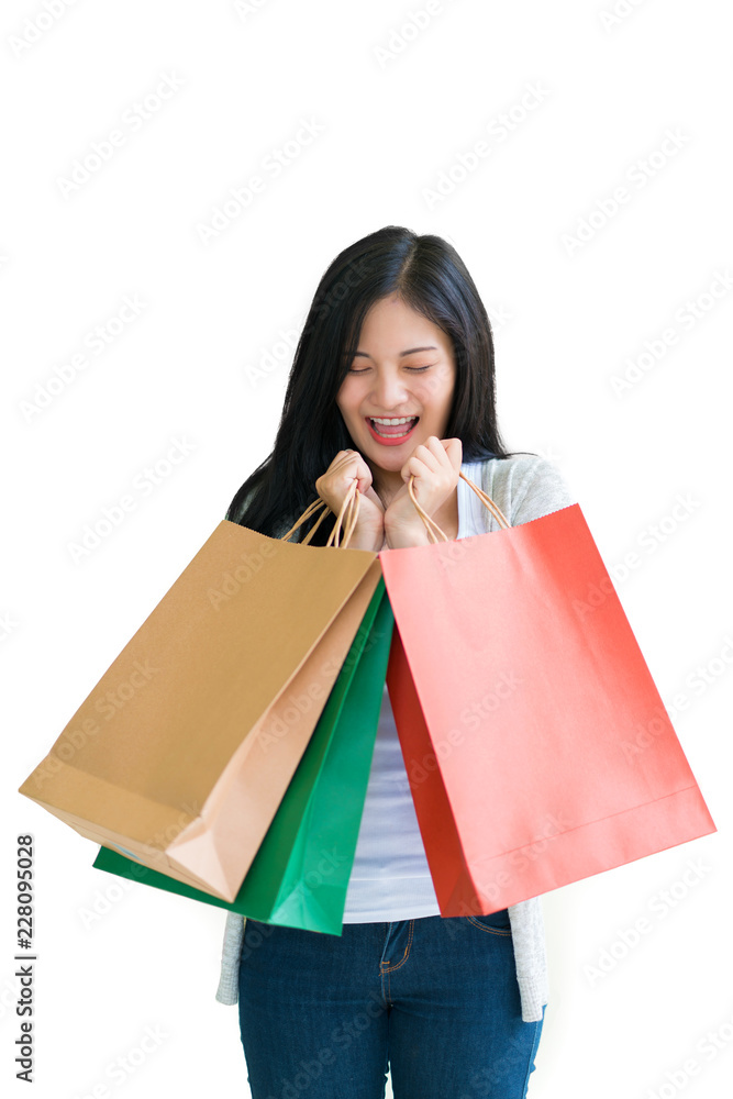 Shopping woman holding bags isolated on white background, consumerism, sale and people concept Shopping woman holding bags isolated on white background, consumerism, sale and people concept