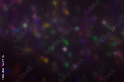 illuminated burst of multicolor light. lens flare shine effects. creative background, abstract