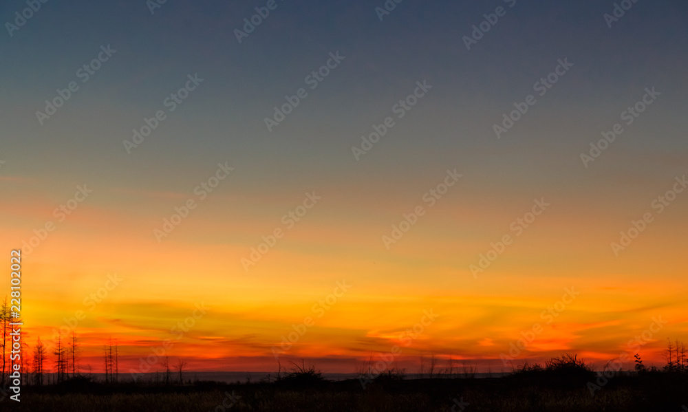 Bright colorful sunset over the field. Bright colorful sunset over the field.
