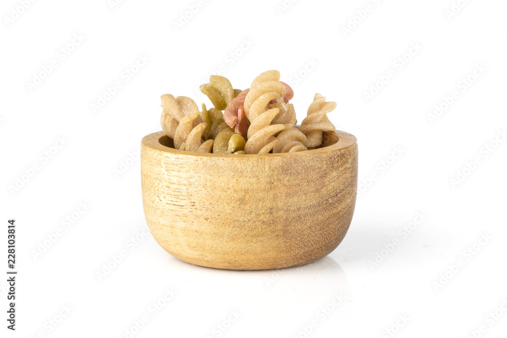 Raw pasta fusilli isolated on white Raw pasta fusilli isolated on white