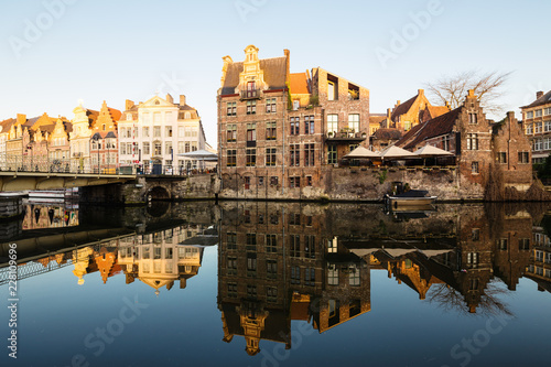 Embankment along the Leie river with medieval houses in the city of Ghent, Belgium