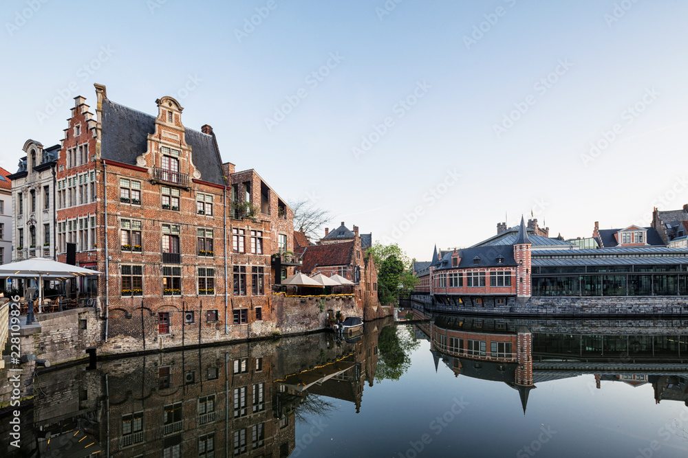 Embankment  along the Leie river with medieval houses in the city of Ghent, Belgium