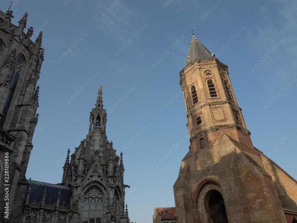 Both towers of St. Peter and Paul's church and St. Peter's tower in Ostend, Belgium.