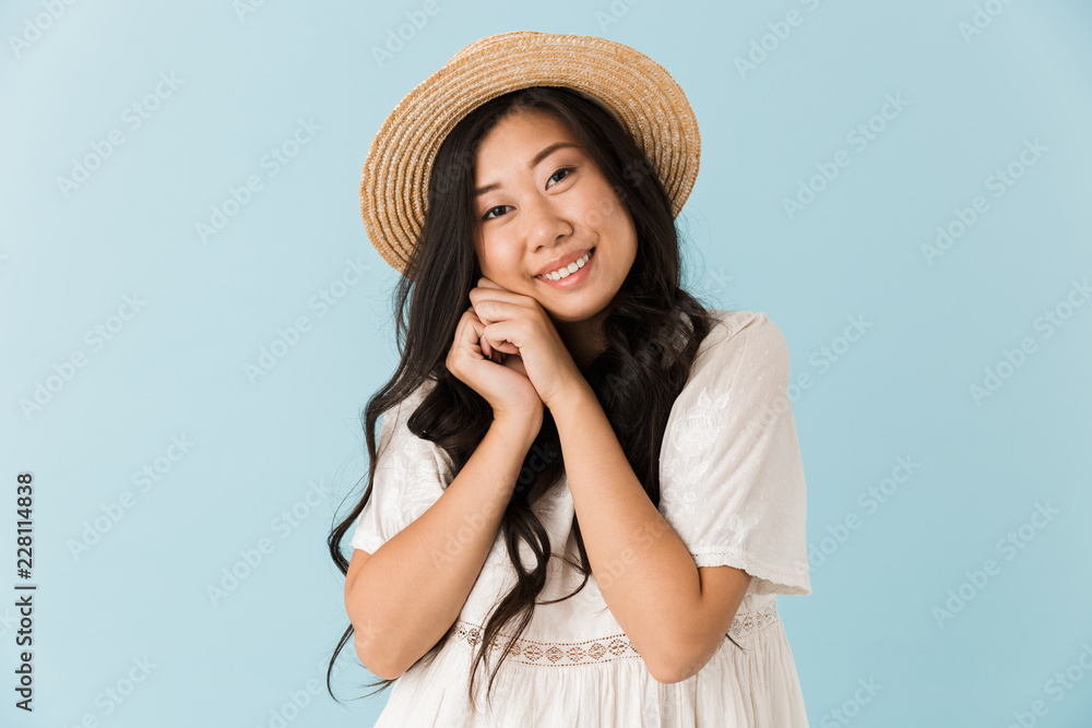 Asian beautiful woman isolated over blue background. Asian beautiful woman isolated over blue background.