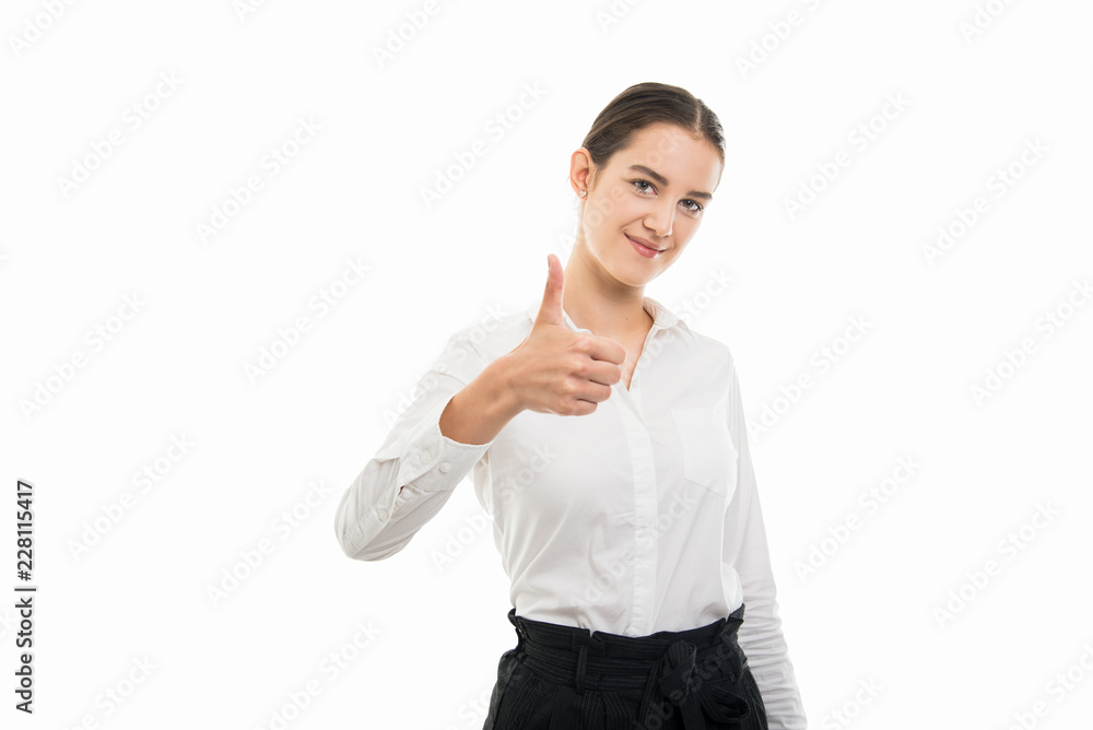 Young pretty bussines woman showing thumb up gesture Young pretty bussines woman showing thumb up gesture