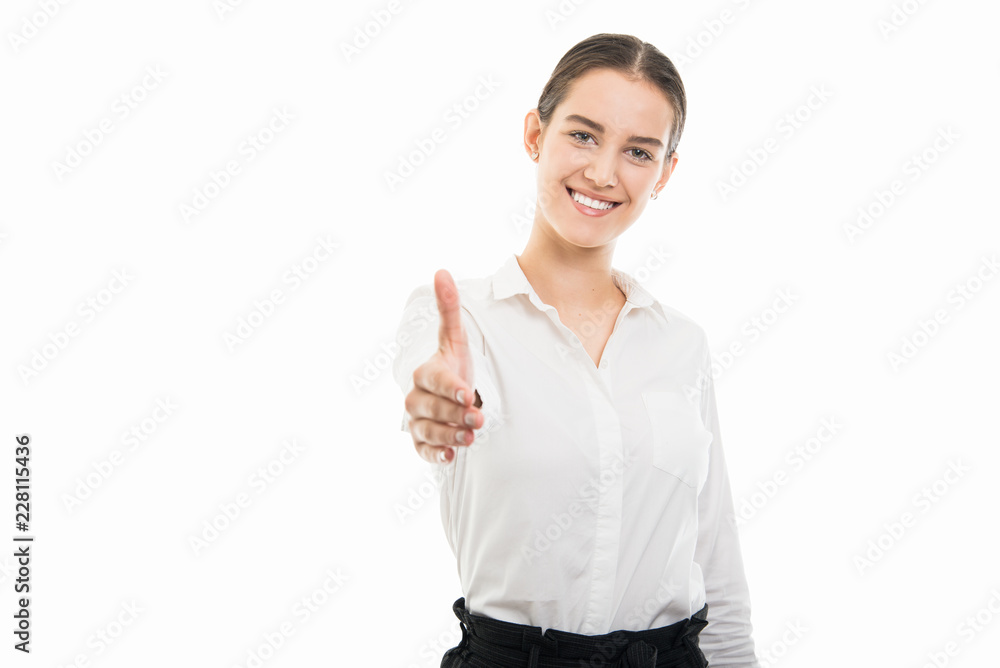 Young pretty bussines woman offering handshake gesture Young pretty bussines woman offering handshake gesture
