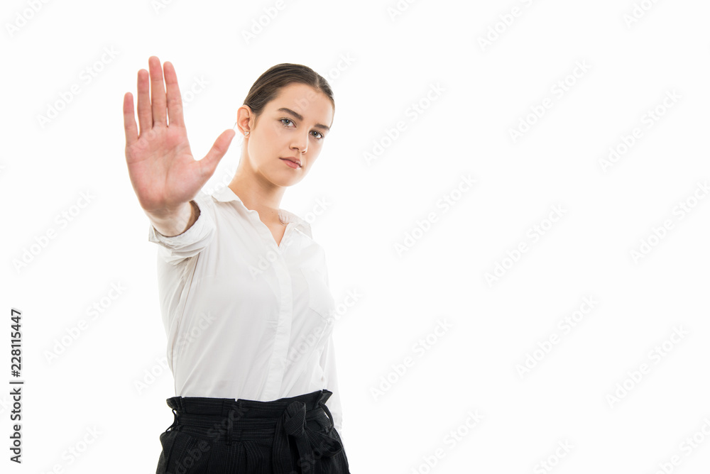 Young pretty bussines woman showing stop gesture Young pretty bussines woman showing stop gesture