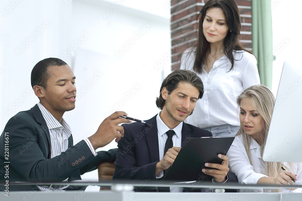 closeup.international business team discussing business issues. photo with place for text closeup.international business team discussing business issues. photo with place for text
