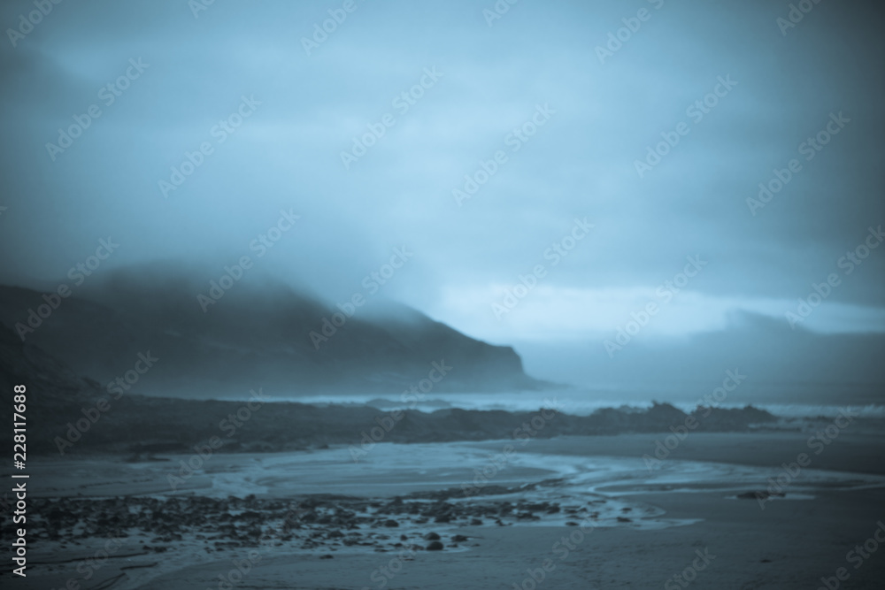 Low Cloud on cliffs and beach