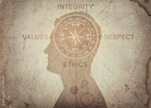 Fotografi Human head and compass points to the ethics, integrity, values, respect