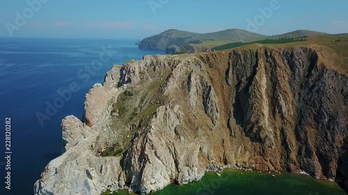 Olkhon Island on Baikal Lake Cape Burhan. Rocky and Sandy Beach Bay in Huzhir Village. Arial Dron Shoot. photo