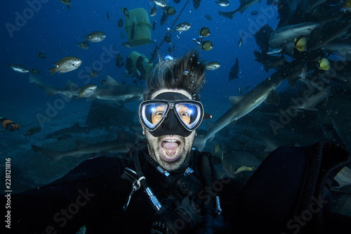 Pancking and Scared Scuba Diver Underwater with Mouth Wide Open