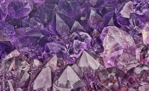dark lilac amethyst crystals close-up backgrond