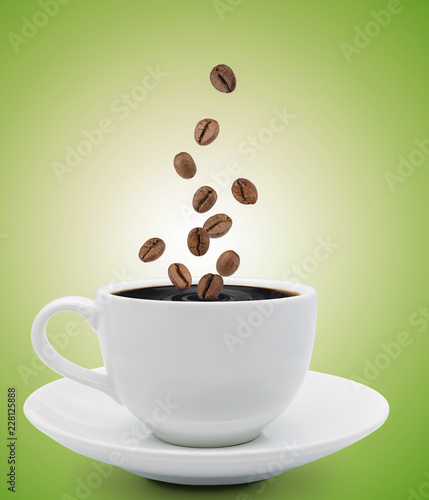 coffee beans falling into cup