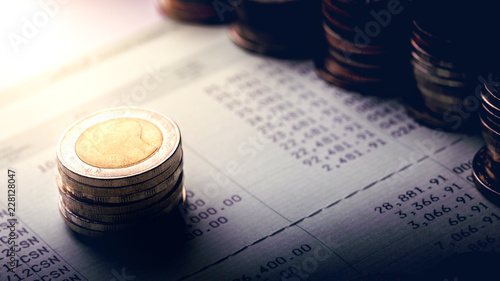 Coins on account book