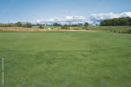 wide angle shot of a golf course on a sunny day