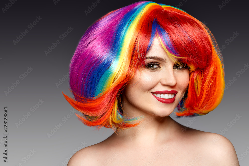 Woman hair as color splash. Rainbow up do short haircut. Beautiful young  girl model with glowing healthy skin. Stock Photo | Adobe Stock