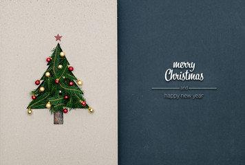 Merry Christmas and happy new year greetings in vertical top view dark blackboard with natural eco decorated christmas tree pine in cardboard.Xmas winter holiday season social media card background 