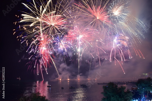 Giochi d'artificio a mare, Sferracavallo, festeggiamenti dei santi patroni SS. Cosimo e Damiano Palermo. Sicilia photo