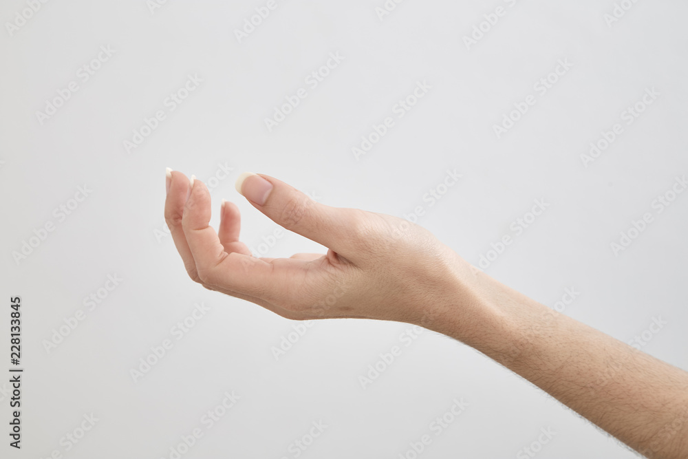 empty female hand on white