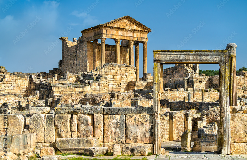 Fototapeta premium The Roman Capitol at Dougga. UNESCO heritage site in Tunisia