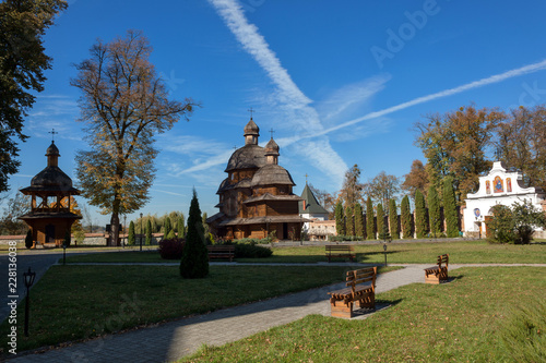 Old Basilian monastery among tree in Krekhiv, Lviv region in Ukraine. Established in the 16 th century 1618 y. photo