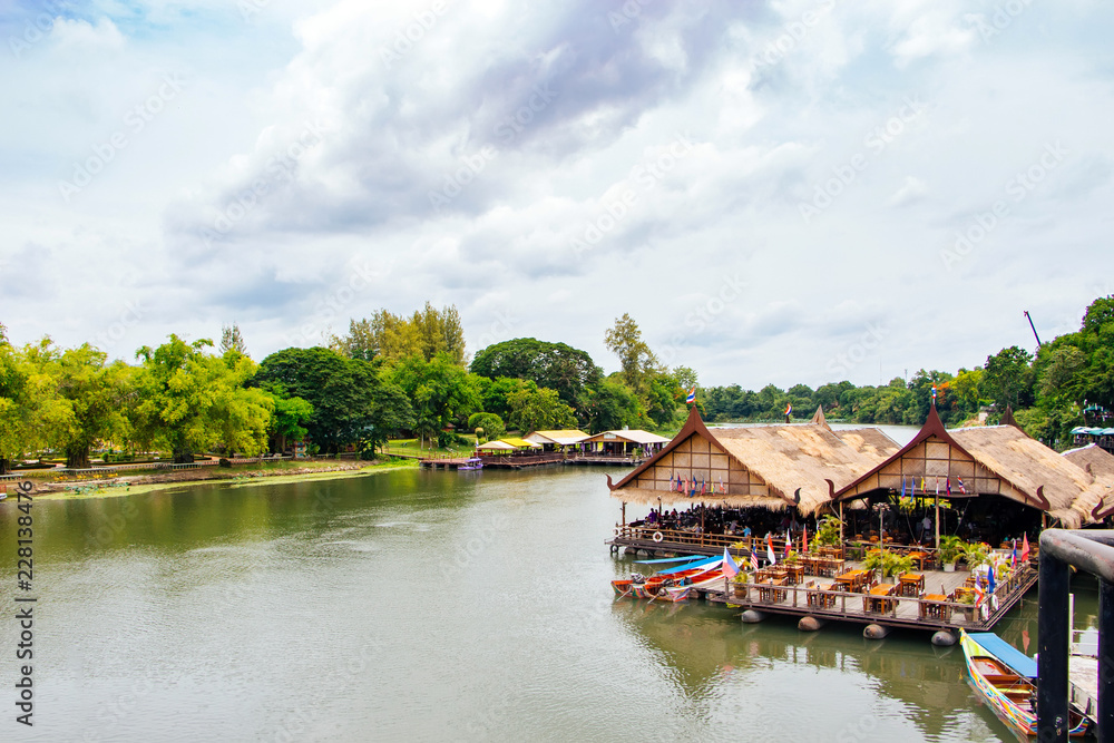 Water floating restaurant on the River Kwai in Kanchanaburi, Thailand Water floating restaurant on the River Kwai in Kanchanaburi, Thailand