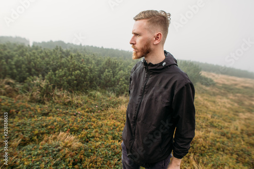 portrait in the fog in the mountains