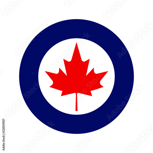 Royal Canadian Air Force or RCAF military roundel with large maple leaf in center.