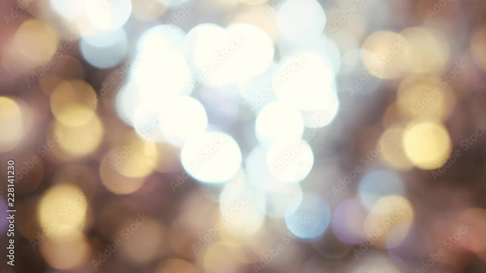 Expensive Large Chandelier Of Glass In A Restaurant Or Concert Hall. Chandelier Lighting In Hall, Bokeh, Glare, Glow, Defocus. Expensive Large Chandelier Of Glass In A Restaurant Or Concert Hall. Chandelier Lighting In Hall, Bokeh, Glare, Glow, Defocus.