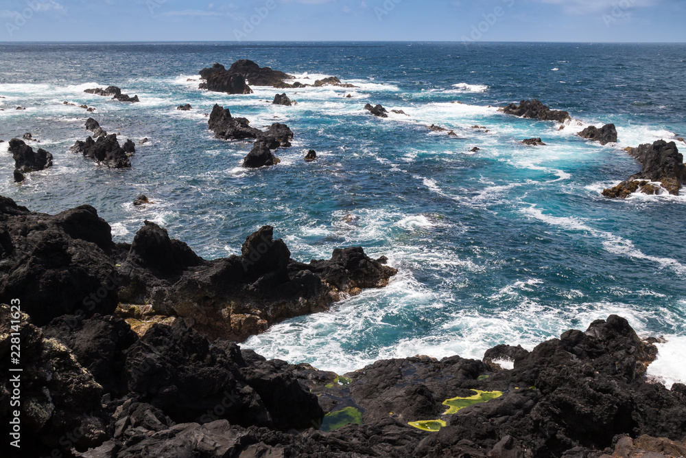 Coastal rocks and Atlantic Ocean at Azores Islands Coastal rocks and Atlantic Ocean at Azores Islands