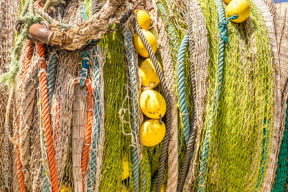 Many fishing nets laid outdoor, drying in the sun. Traditional craft of spain Mallorca, Spain, Western Europe.
