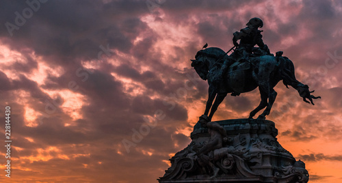Statue of a horseman standing in the morning sunrise