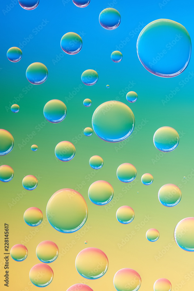 close-up view of beautiful transparent water drops on abstract background